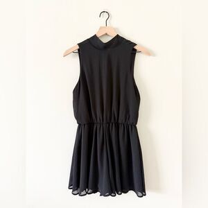 The Impeccable Pig High Neck Sleeveless Romper in Black - Size M